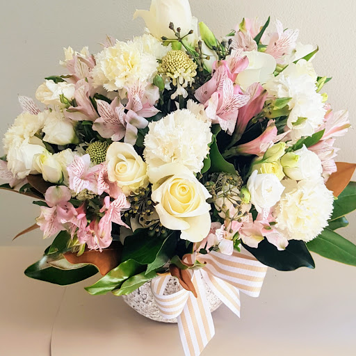 White Carnations, Alstromeria, Lisiathus And Roses In Clay Pot